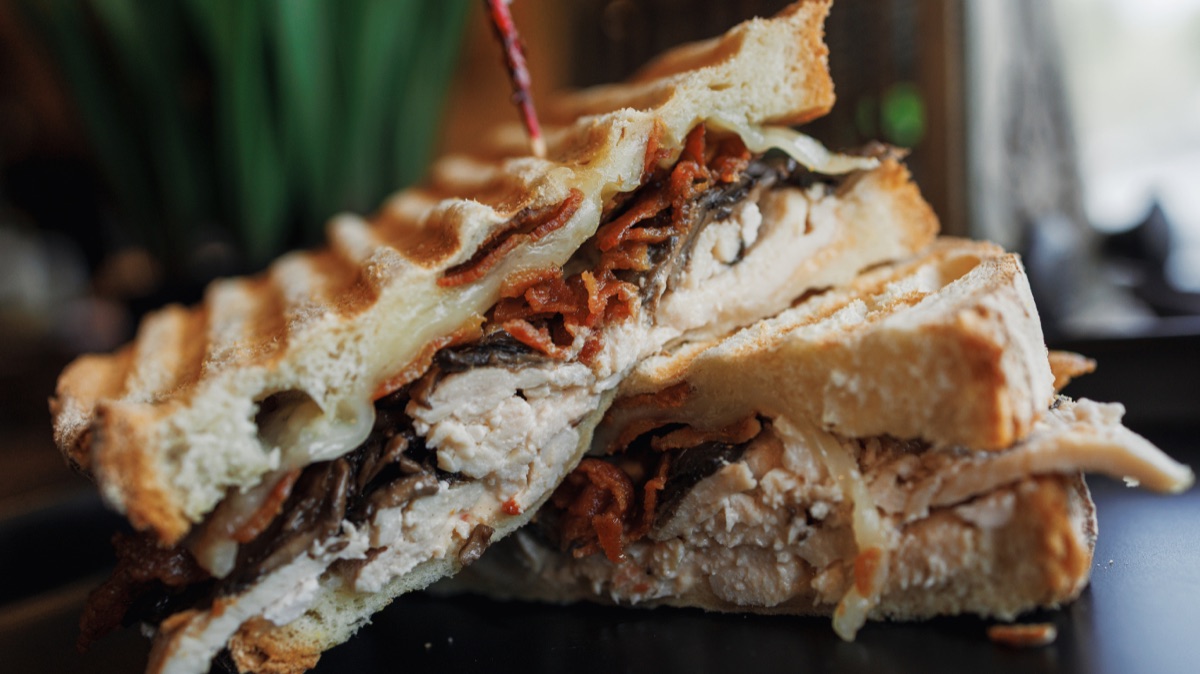 Turkey panini with sun-dried tomatoes, stacked and skewered