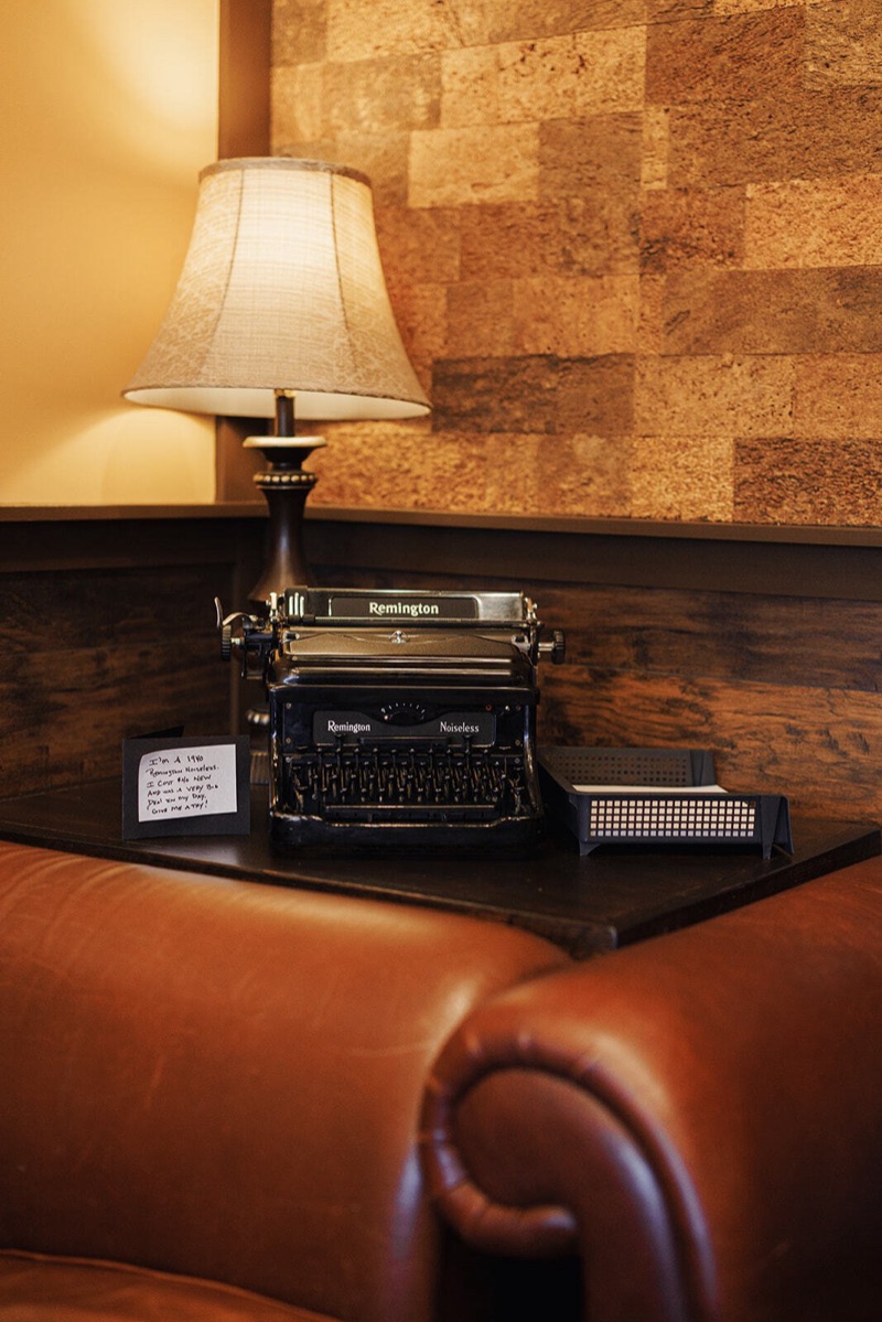 Vintage Remington typewriter in a cozy corner of the café